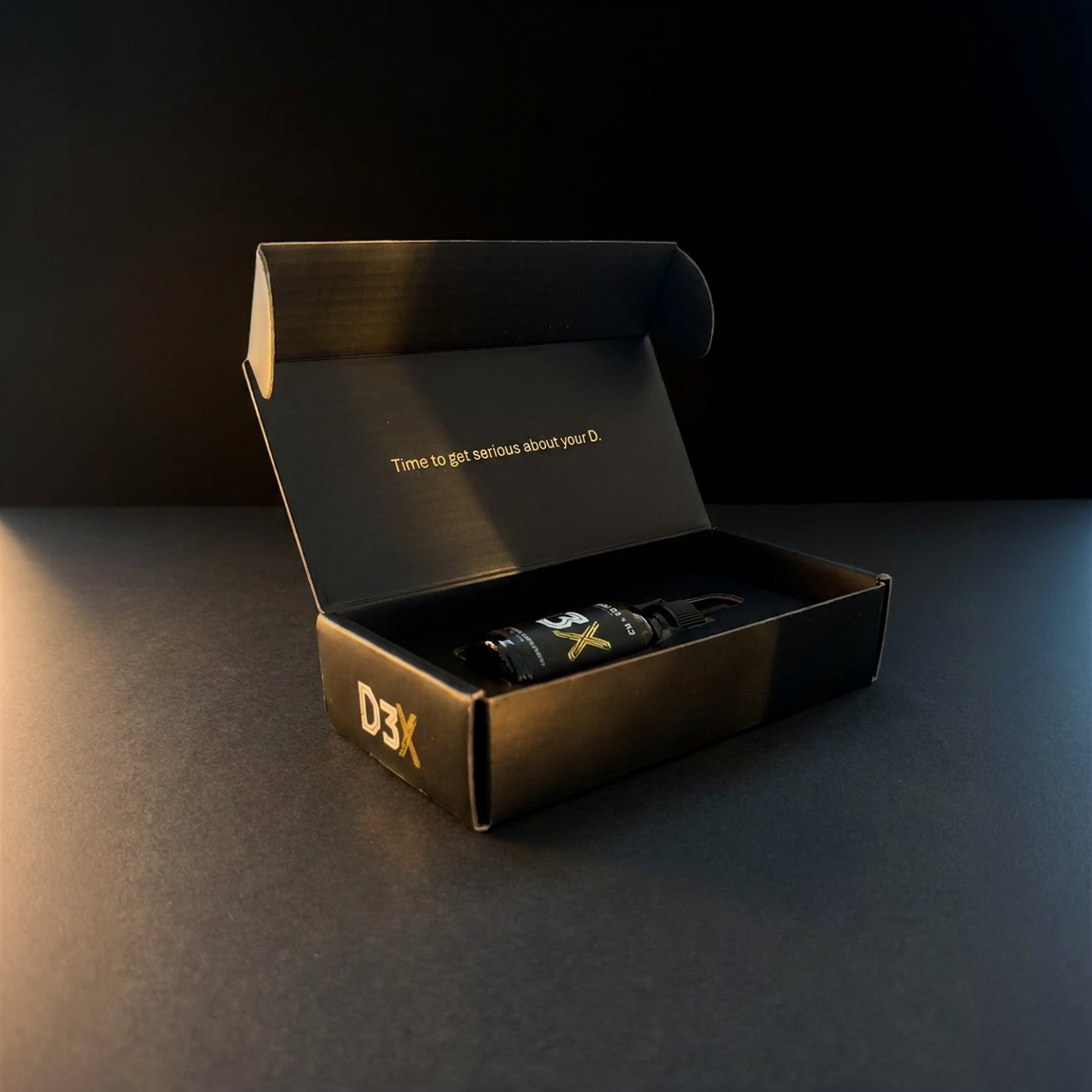 D3X liquid Vitamin D3 + K2 supplement displayed in premium black packaging box